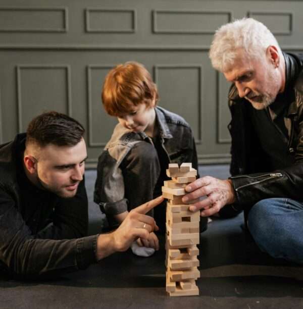 Son Dad Grandpa playing together